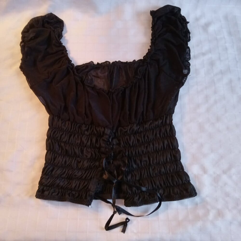 Pretty black baby doll with fringes skirt and short sleeve top in whith lace